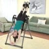 Teeter Hang Ups Contour L5 Ltd. Inversion Table with Model inverted.