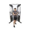 Bodycraft HFT Pro Functional Training Gym with model doing standing cable fly.