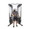 Bodycraft HFT Pro Functional Training Gym with model doing single arm bicep curl.