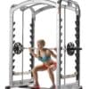Hoist MI-Smith Cage with model doing squats.