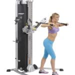 Hoist MI-5 Functional Training Gym with model doing chest press.