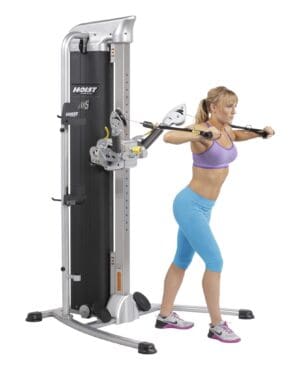 Hoist MI-5 Functional Training Gym with model doing chest press.