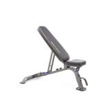 An adjustable weight bench with a black cushioned seat and backrest on a sturdy gray metal frame against a white background.