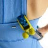 TEETER - T3 Massager with model using pressure point roller under shoulder blade.