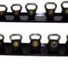 Troy Barbell Club Kettlebells 8 to 50 pound dumbbells on dumbbell shelf.