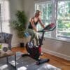 Echelon EX-3 Indoor Cycle with female Model.