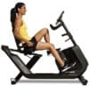 Horizon Comfort R Recumbent Bike with Model facing right.