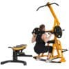 Powertec Workbench Levergym in yellow with two weight plates and squat bar attachment with seat detached and Model doing squats.