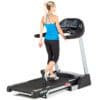 3G Cardio Pro Runner Treadmill with Model walking on it.