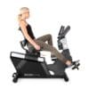 3g Cardio Elite Recumbent Bike with model pedaling.