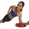 GoFit Core Stability and Balance Disk with model doing side plank.