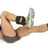 GoFit Padded Pro Ankle Weights with model doing knee to elbow crunches.
