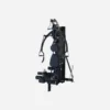 A versatile home gym machine with adjustable components for strength training exercises, including arms, legs, and core.