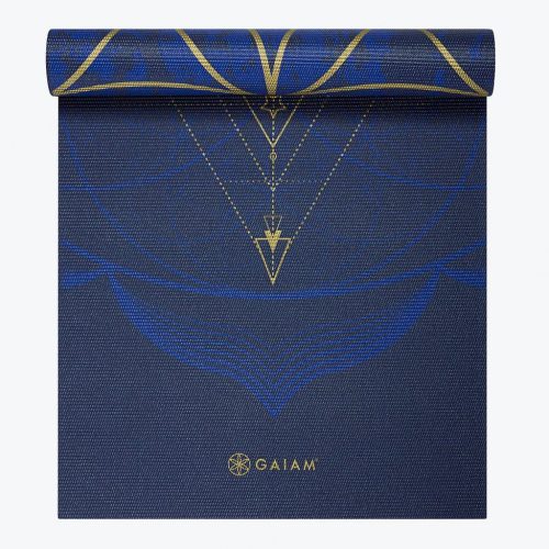 Reversible Metallic Sun & Moon Yoga Mat - 6mm top view rolled up showing sun/moon side.